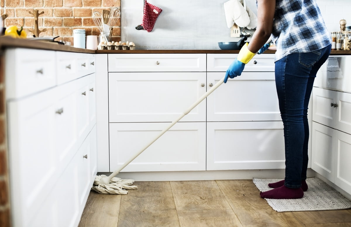 Black woman doing house chores