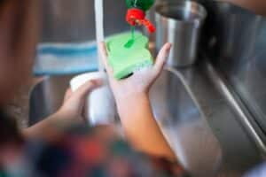 Soap on a sponge for deep cleaning services Dallas Sunrise Maids Plano, TX