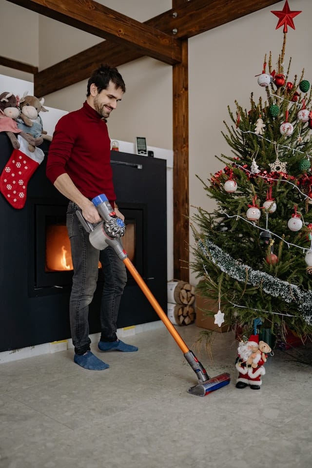 a man cleaning for the holiday season