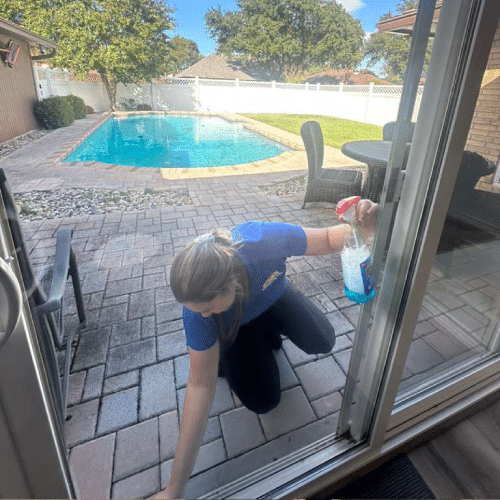 Sliding door glass cleaning by Dallas Sunrise Maids in Frisco