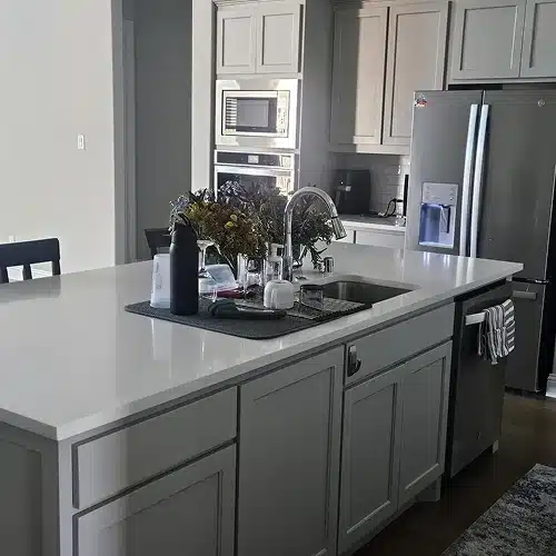 Pristine modern bathroom with double vanity and glass shower showcasing move out cleaning vs deep cleaning results by Dallas Sunrise Maids in Plano, TX