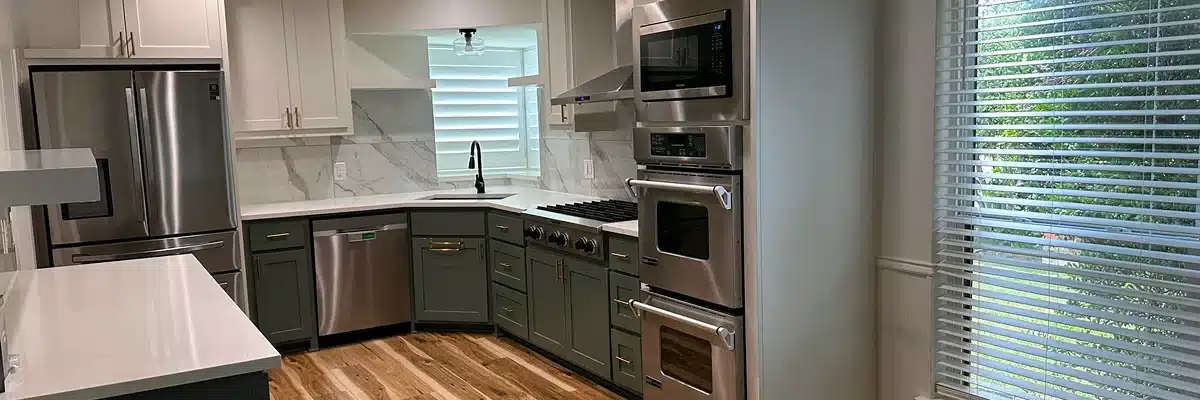 Bright modern kitchen with stainless steel ovens and white cabinets cleaned to perfection by Dallas Sunrise Maids, showcasing move out cleaning vs deep cleaning in Plano, TX